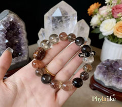 Pixiu Wealth Ward – Pixiu‑Carved Black Gold Super Seven, Silver Obsidian, Tea Rutilated Quartz + Runner Bead