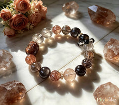Pixiu Wealth Ward – Pixiu‑Carved Black Gold Super Seven, Silver Obsidian, Tea Rutilated Quartz + Runner Bead