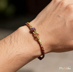 Rainbow Resilience Cord — Handwoven Festival Bracelet