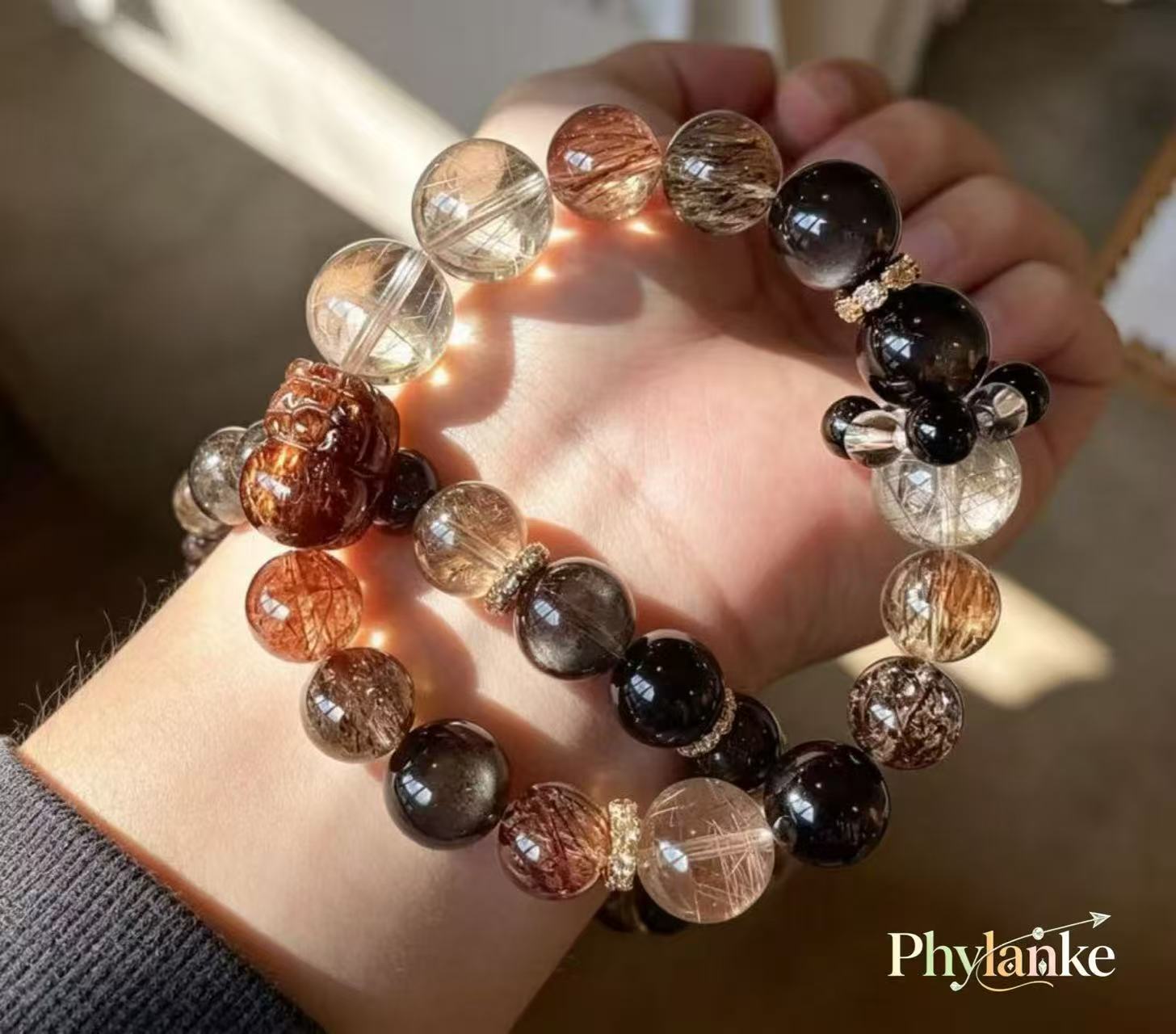 Pixiu Wealth Ward – Pixiu‑Carved Black Gold Super Seven, Silver Obsidian, Tea Rutilated Quartz + Runner Bead