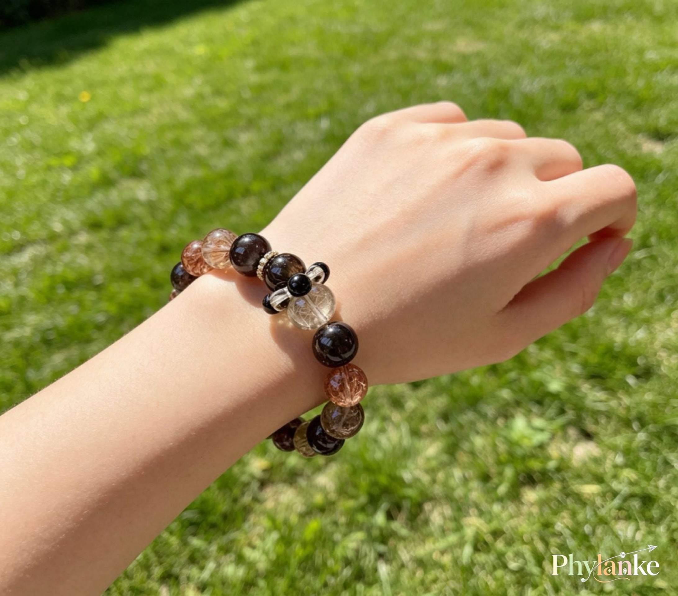 Pixiu Wealth Ward – Pixiu‑Carved Black Gold Super Seven, Silver Obsidian, Tea Rutilated Quartz + Runner Bead