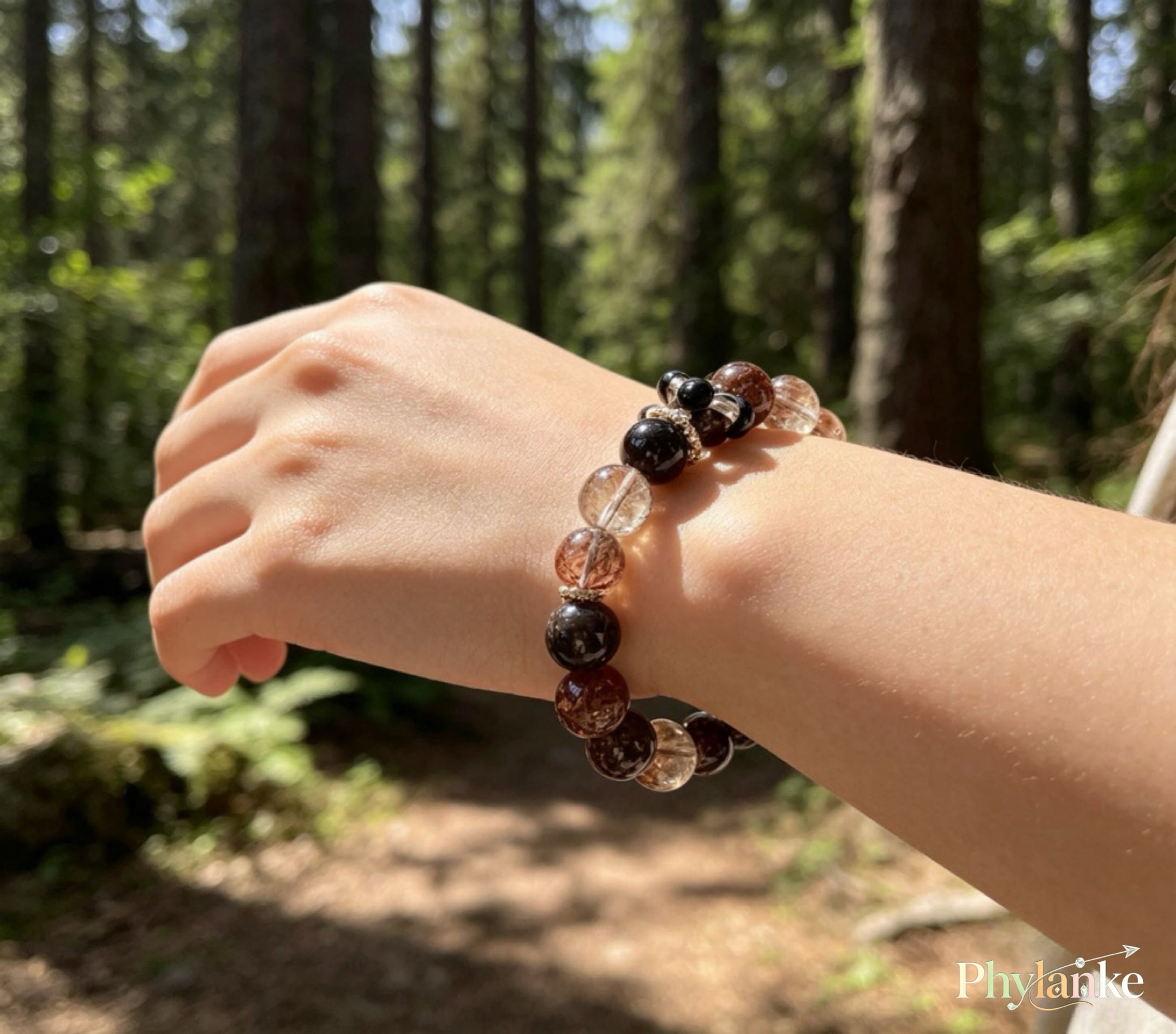 Pixiu Wealth Ward – Pixiu‑Carved Black Gold Super Seven, Silver Obsidian, Tea Rutilated Quartz + Runner Bead